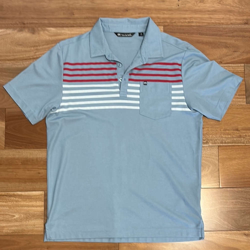 Travis Mathew Blue and Red Polo Shirt with Modern Stripes
